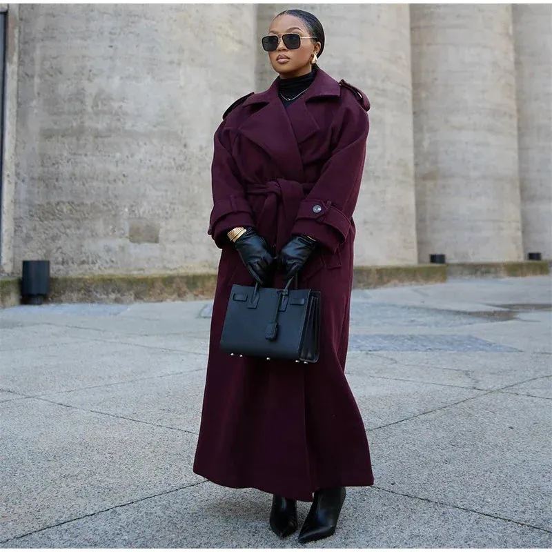 Elegant long coat with khaki belt