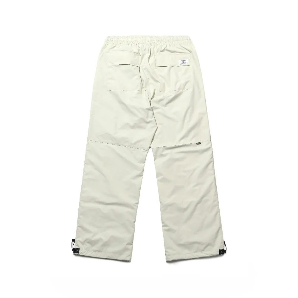 TWK BOX TRACK PANTS CREAM