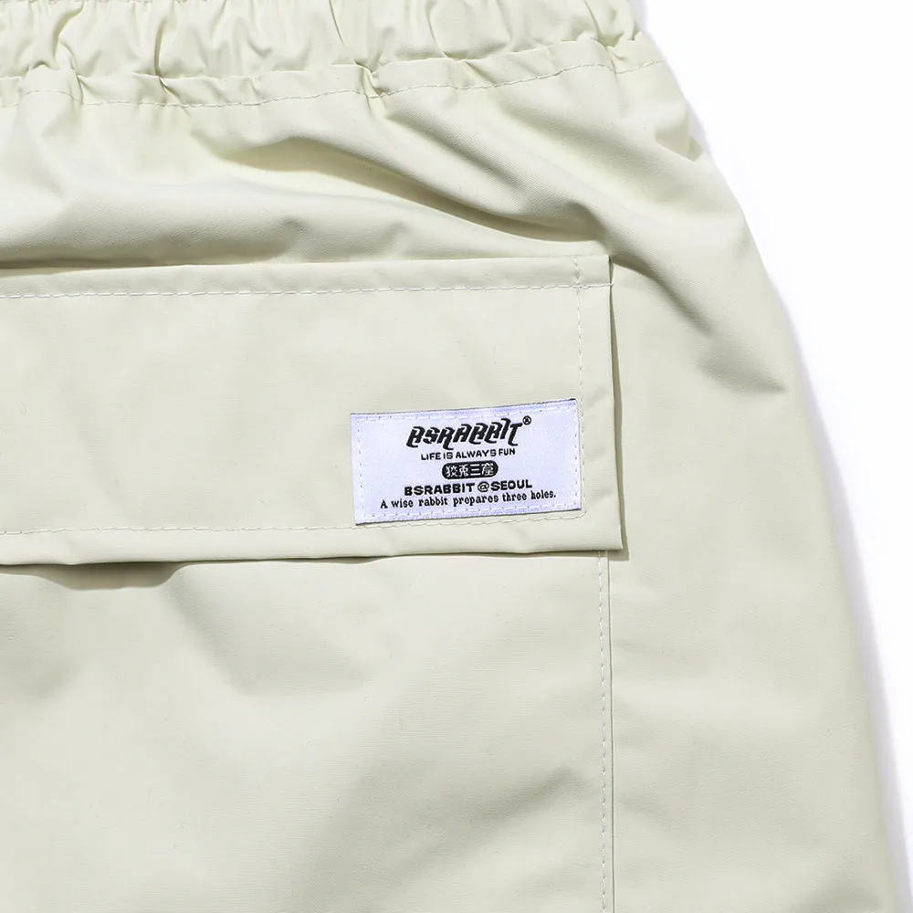 TWK BOX TRACK PANTS CREAM